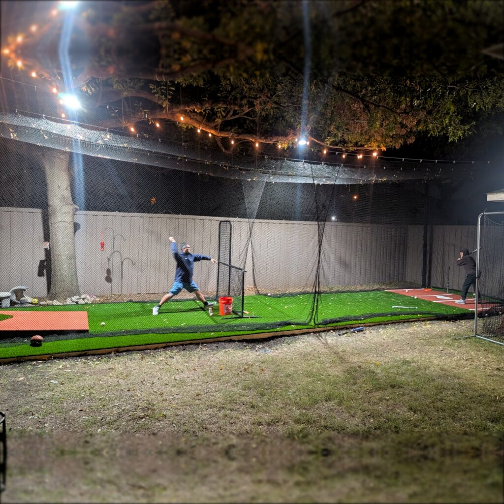 A side perspective of the multi-use outdoor hitting net for golf and baseball practice.